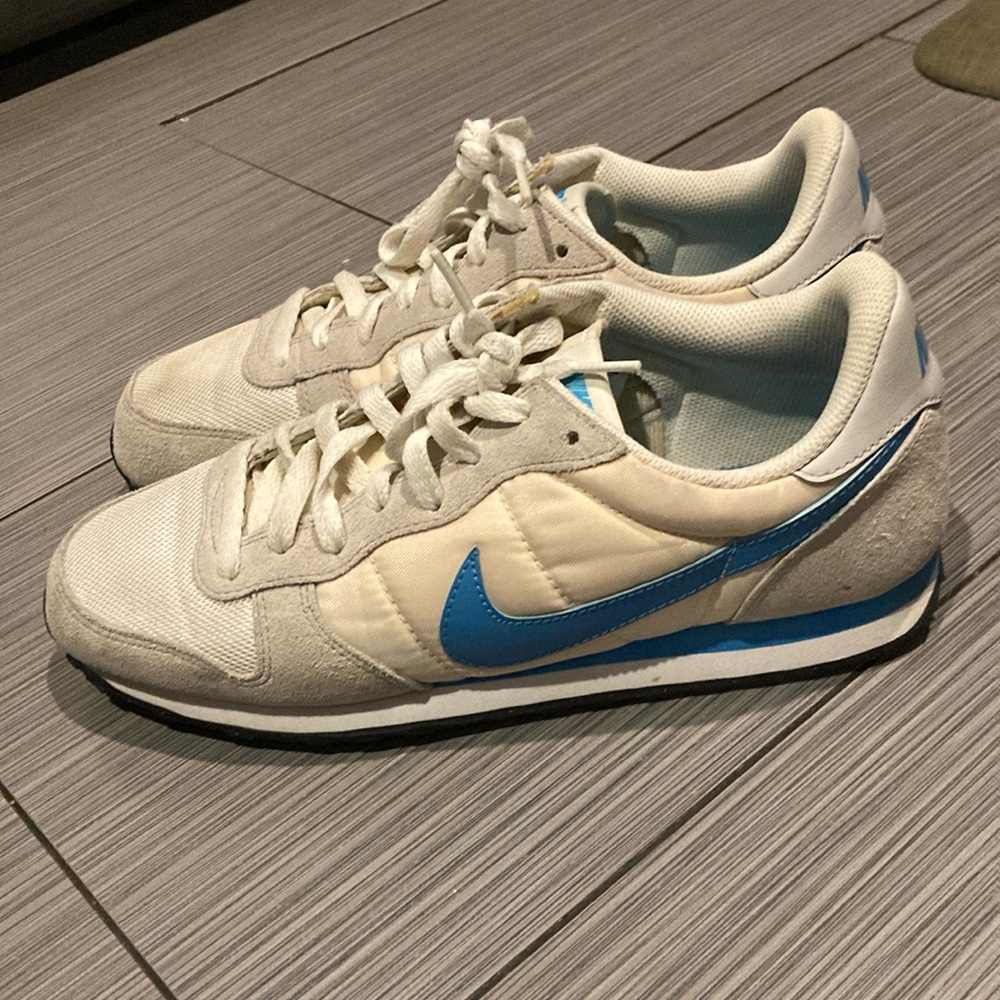 Men’s cream and light blue tennis shoes size 9.